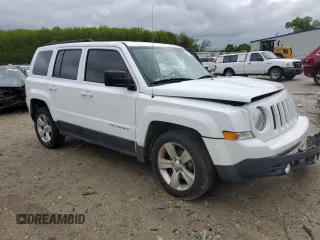 2017 Jeep Patriot Latitude with VIN 1C4NJPFB9HD187411, listed as a Copart auction lot 52579165 with 153,869 mi miles and Salvage Title. Bid and sale history available at DreamBid. Image 4.