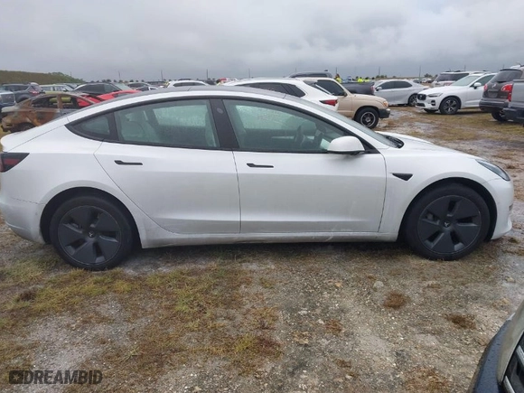 2022 Tesla Model 3 Long Range with VIN 5YJ3E1EBXNF267363, listed as a IAAI auction lot 40494604 with NaN miles. Bid and sale history available at carsss.com. Image 13.