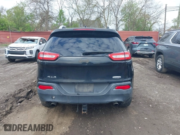 2014 Jeep Cherokee Latitude with VIN 1C4PJMCS0EW208092, listed as a IAAI auction lot 42174675 with 202,871 mi miles and . Bid and sale history available at carsss.com. Image 16.