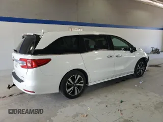 2018 Honda Odyssey Elite with VIN 5FNRL6H90JB103748, listed as a Copart auction lot 61512595 with 117,126 mi miles and Salvage title. Bid and sale history available at DreamBid. Image 3.