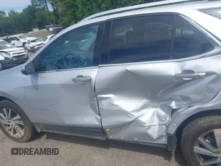 2022 Chevrolet Equinox Premier z VIN 2GNAXXEVXN6146327, wystawiony jako IAAI lot #42294870 z przebiegiem 68 276 mil mil oraz . Historia ofert i sprzedaży dostępna na DreamBid. Obrazek 14.