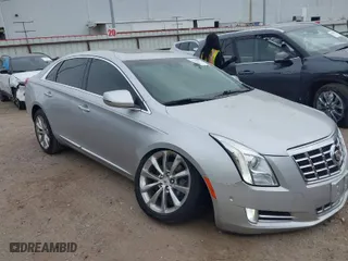 2014 Cadillac XTS Luxury with VIN 2G61M5S3XE9178236, listed as a IAAI auction lot 41786581 with 39,844 mi miles. Bid and sale history available at carsss.com. Image 1.