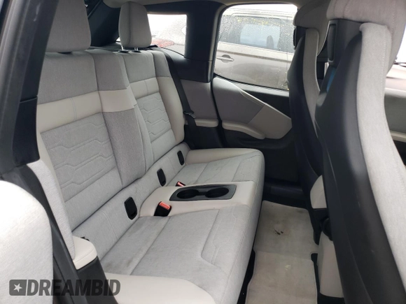 2015 BMW i3 z VIN WBY1Z4C56FV501350, wystawiony jako Copart lot #42556945 z przebiegiem 37 266 mil mil oraz Czysty tytuł • Clean title. Historia ofert i sprzedaży dostępna na DreamBid. Obrazek 10.
