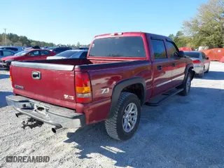 2006 GMC Sierra 1500 SLT with VIN 2GTEK13T761129104, listed as a IAAI auction lot 41811270 with 128,508 mi miles. Bid and sale history available at carsss.com. Image 4.