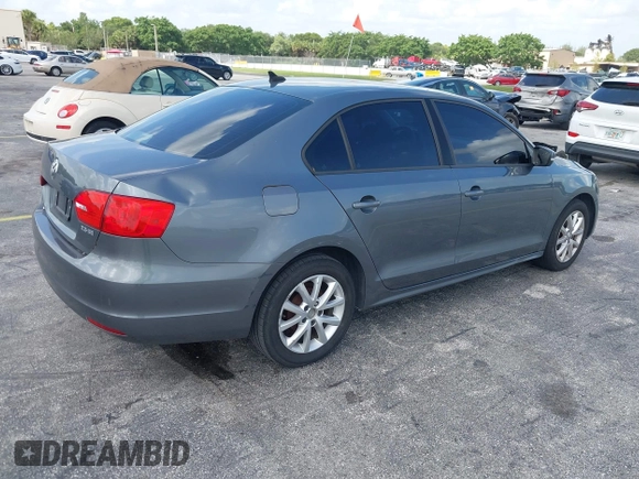 2011 Volkswagen Jetta SE with VIN 3VWDZ7AJ2BM080390, listed as a IAAI auction lot 42723802 with 157,117 mi miles and . Bid and sale history available at DreamBid. Image 4.