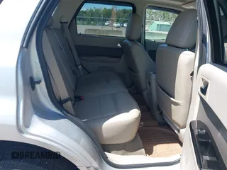 2009 Ford Escape Hybrid z VIN 1FMCU593X9KA59775, wystawiony jako IAAI lot #42763464 z przebiegiem 142 396 mil mil oraz . Historia ofert i sprzedaży dostępna na DreamBid. Obrazek 8.