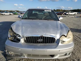 2005 Hyundai Sonata GLS with VIN KMHWF35H95A116657, listed as a Copart auction lot 77614154 with 101,164 mi miles and Salvage Title. Bid and sale history available at carsss.com. Image 5.
