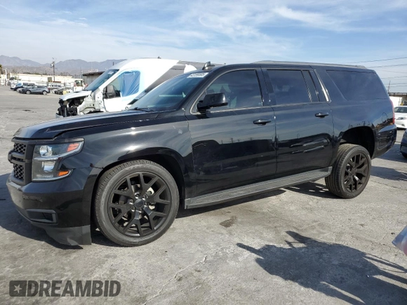 2018 Chevrolet Suburban LS with VIN 1GNSCGEC4JR383988, listed as a Copart auction lot 43199585 with 79,469 mi miles and Salvage title. Bid and sale history available at DreamBid. Image 1.