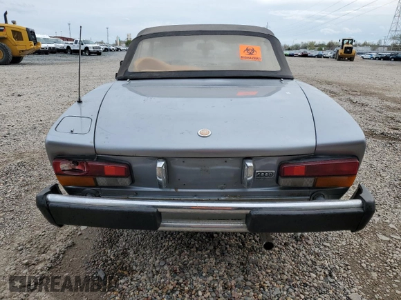 1980 FIAT 124 Spider z VIN 124CS000167543, wystawiony jako Copart lot #53031904 z przebiegiem 60 115 mil mil oraz Nie do naprawy • Non repairable. Historia ofert i sprzedaży dostępna na DreamBid. Obrazek 6.