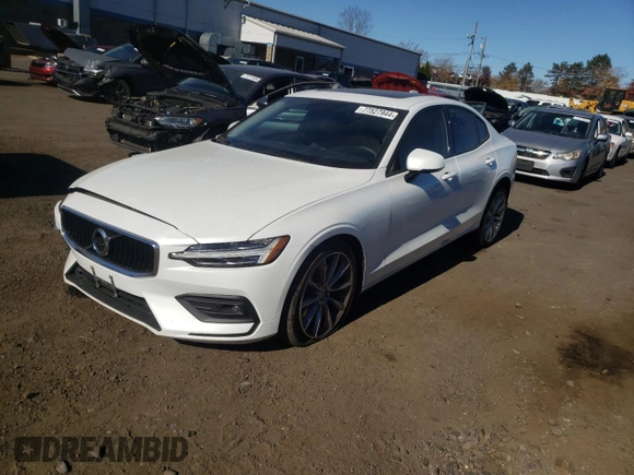 2021 Volvo S60 Momentum with VIN 7JRA22TK6MG102246, listed as a Copart auction lot 77527944 with 59,800 mi miles and Salvage Title. Bid and sale history available at carsss.com. Image 1.