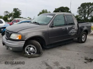 2002 Ford F-150 XLT with VIN 1FTRW08662KC45830, listed as a Copart auction lot 69485294 with 218,248 mi miles and Salvage Title. Bid and sale history available at carsss.com. Image 1.