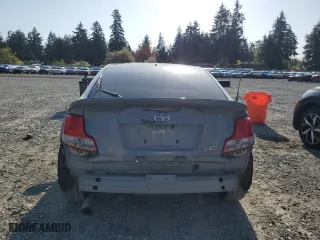2011 Scion tC with VIN JTKJF5C76B3000765, listed as a Copart auction lot 53954445 with 243,554 mi miles and Salvage Title. Bid and sale history available at carsss.com. Image 6.