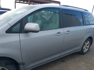 2012 Toyota Sienna LE AAS with VIN 5TDKK3DC1CS193107, listed as a IAAI auction lot 42068706 with 106,930 mi miles and . Bid and sale history available at DreamBid. Image 14.