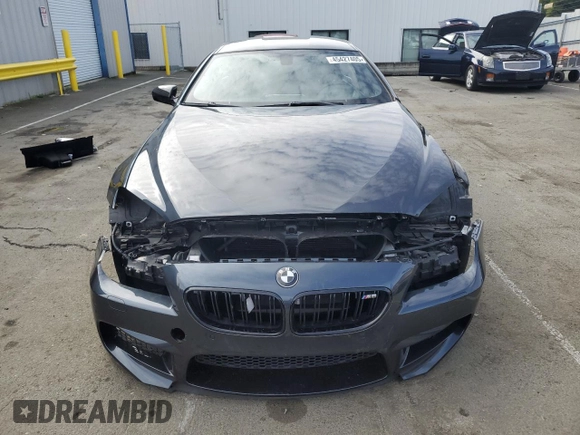 2014 BMW M6 with VIN WBS6C9C56ED467395, listed as a Copart auction lot 45427405 with 91,506 mi miles and Salvage title. Bid and sale history available at DreamBid. Image 5.