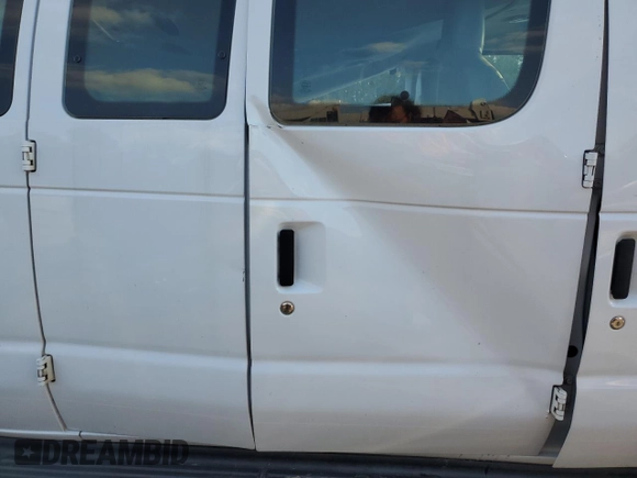2013 Ford Econoline Passenger XL with VIN 1FBSS3BL5DDA77574, listed as a Copart auction lot 79841714 with 61,321 mi miles and Salvage Title. Bid and sale history available at DreamBid. Image 11.