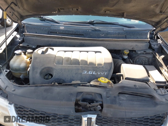 2013 Dodge Journey SXT with VIN 3C4PDDBG1DT606887, listed as a IAAI auction lot 42440507 with 250,836 mi miles and . Bid and sale history available at DreamBid. Image 10.