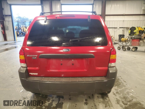 2007 Ford Escape XLT with VIN 1FMYU03Z27KA05874, listed as a Copart auction lot 73295564 with 127,088 mi miles and Salvage Title. Bid and sale history available at carsss.com. Image 6.