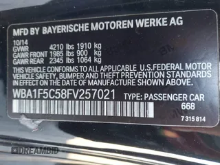 2015 BMW 2 Series 228i with VIN WBA1F5C58FV257021, listed as a IAAI auction lot 41318026 with 154,906 mi miles. Bid and sale history available at carsss.com. Image 9.