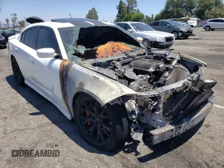 2019 Dodge Charger SRT Hellcat z VIN 2C3CDXL92KH540649, wystawiony jako Copart lot #51480231 z przebiegiem Nie podano mil oraz Szkody całkowita. Historia ofert i sprzedaży dostępna na DreamBid. Obrazek 1.