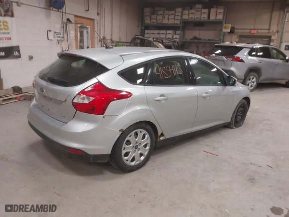 2012 Ford Focus SE with VIN 1FAHP3K26CL432308, listed as a IAAI auction lot 41854113 with 153,094 mi miles. Bid and sale history available at carsss.com. Image 4.