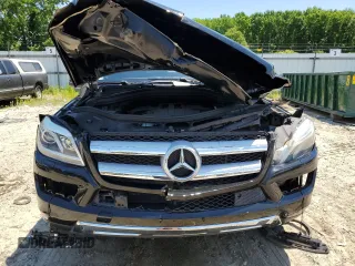 2015 Mercedes-Benz GL-Class GL 450 with VIN 4JGDF6EE1FA562088, listed as a Copart auction lot 58736934 with 104,550 mi miles and Salvage Title. Bid and sale history available at carsss.com. Image 5.