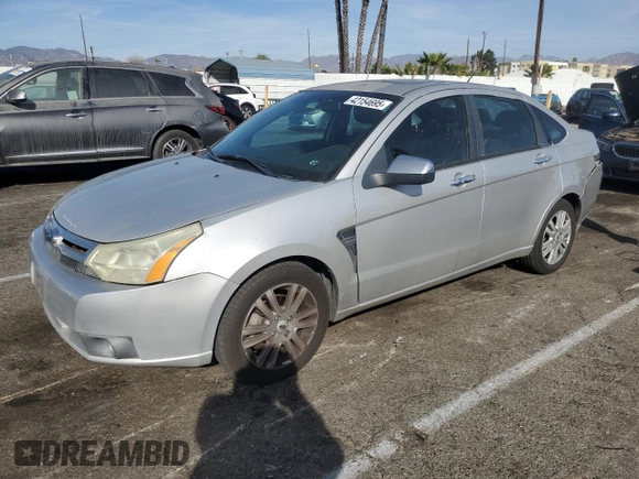 2009 Ford Focus SEL with VIN 1FAHP37N39W232674, listed as a Copart auction lot 42154695 with 127,764 mi miles and Salvage Title. Bid and sale history available at carsss.com. Image 1.