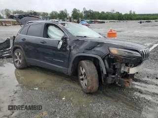 2019 Jeep Cherokee Limited with VIN 1C4PJLDX1KD143488, listed as a Copart auction lot 56759085 with 70,395 mi miles and Salvage title. Bid and sale history available at DreamBid. Image 4.