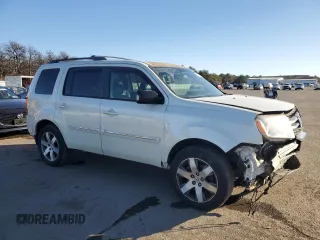 2014 Honda Pilot Touring with VIN 5FNYF4H90EB045332, listed as a Copart auction lot 42993945 with 120,248 mi miles and Salvage Title. Bid and sale history available at DreamBid. Image 4.