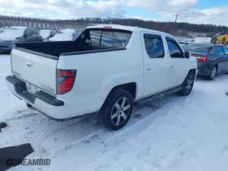 2014 Honda Ridgeline SE with VIN 5FPYK1F6XEB007553, listed as a IAAI auction lot 41281193 with 159,699 mi miles. Bid and sale history available at carsss.com. Image 4.