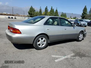 1997 Lexus ES 300 Luxury Sport Sdn with VIN JT8BF22GXV5010055, listed as a Copart auction lot 76507554 with 177,269 mi miles and Salvage Title. Bid and sale history available at carsss.com. Image 3.