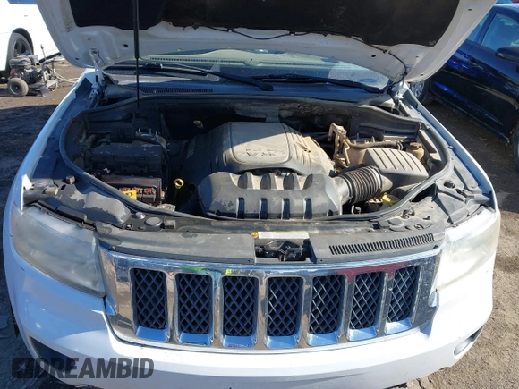 2013 Jeep Grand Cherokee Overland with VIN 1C4RJECT4DC526160, listed as a IAAI auction lot 41429164 with 115,311 mi miles. Bid and sale history available at carsss.com. Image 10.