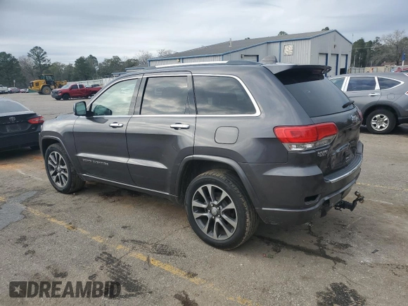 2017 Jeep Grand Cherokee Overland with VIN 1C4RJECG2HC903366, listed as a Copart auction lot 44140155 with 102,459 mi miles and Salvage title. Bid and sale history available at DreamBid. Image 2.