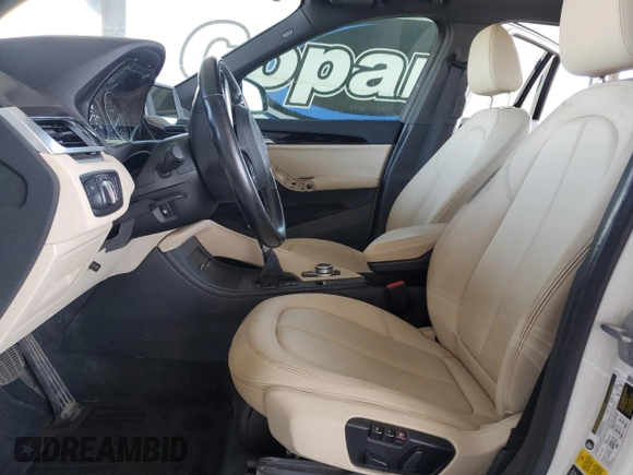 2017 BMW X1 xDrive28i with VIN WBXHT3C35H5F73546, listed as a Copart auction lot 59544545 with 125,185 mi miles and Salvage title. Bid and sale history available at DreamBid. Image 7.