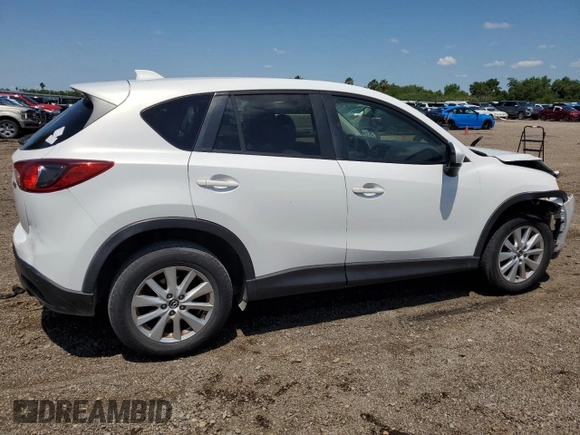 2014 Mazda CX-5 Touring with VIN JM3KE2CY9E0305244, listed as a Copart auction lot 56205605 with 164,516 mi miles and Salvage Title. Bid and sale history available at DreamBid. Image 3.