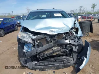 2015 Toyota Sienna XLE with VIN 5TDYK3DC3FS609947, listed as a IAAI auction lot 42097199 with Not provided miles and . Bid and sale history available at DreamBid. Image 13.