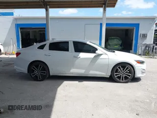 2019 Chevrolet Malibu LS with VIN 1G1ZB5ST1KF214994, listed as a IAAI auction lot 42220066 with 56,778 mi miles and . Bid and sale history available at DreamBid. Image 13.