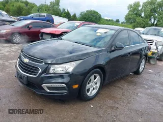 2015 Chevrolet Cruze LT with VIN 1G1PC5SB5F7286048, listed as a IAAI auction lot 41113939 with 129,501 mi miles and . Bid and sale history available at DreamBid. Image 2.