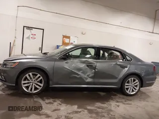 2018 Volkswagen Passat SE z VIN 1VWBA7A36JC009970, wystawiony jako IAAI lot #42179127 z przebiegiem 86 612 mil mil oraz . Historia ofert i sprzedaży dostępna na DreamBid. Obrazek 14.