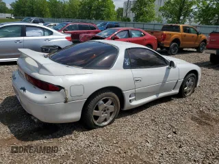 1998 Mitsubishi 3000GT GT z VIN JA3AM84J7WY003884, wystawiony jako Copart lot #59136565 z przebiegiem 274 171 mil mil oraz Tytuł czysty. Historia ofert i sprzedaży dostępna na DreamBid. Obrazek 3.