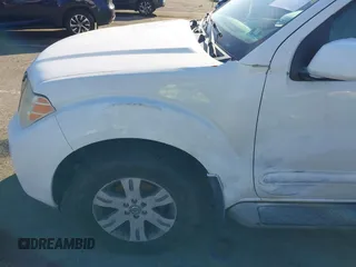 2010 Nissan Pathfinder SE with VIN 5N1AR1NB9AC629519, listed as a IAAI auction lot 41772962 with 192,593 mi miles and . Bid and sale history available at DreamBid. Image 13.