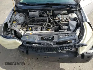 2008 Ford Focus SE z VIN 1FAHP35N18W272057, wystawiony jako Copart lot #59867425 z przebiegiem 293 894 mil mil oraz Szkoda całkowita • Salvage title. Historia ofert i sprzedaży dostępna na DreamBid. Obrazek 11.
