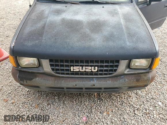 1993 Isuzu Pickup S z VIN 4S1CL11L2P4207469, wystawiony jako Copart lot #79279374 z przebiegiem 144 885 mil mil oraz Tytuł czysty. Historia ofert i sprzedaży dostępna na DreamBid. Obrazek 11.