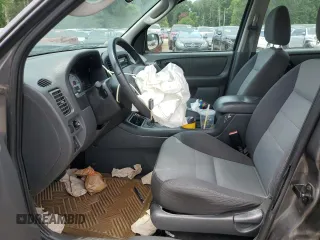 2005 Ford Escape XLS Value with VIN 1FMYU02ZX5KA88548, listed as a Copart auction lot 64025804 with 176,155 mi miles and Salvage Title. Bid and sale history available at carsss.com. Image 7.