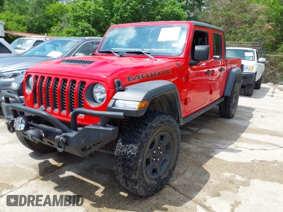 2021 Jeep Gladiator Mojave with VIN 1C6JJTEG6ML533927, listed as a IAAI auction lot 42056253 with 92,317 mi miles and . Bid and sale history available at DreamBid. Image 2.