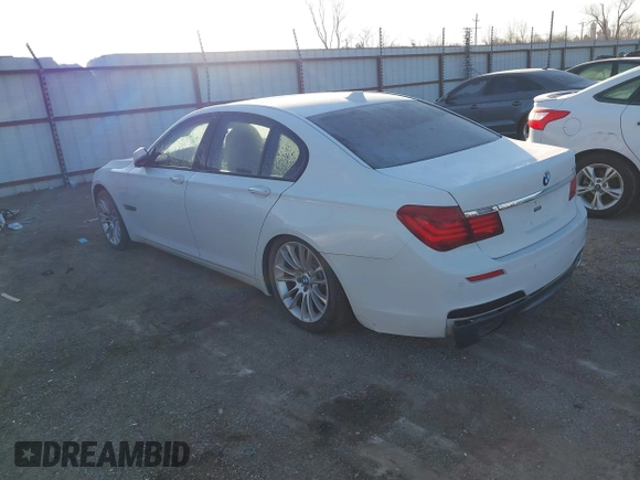 2013 BMW 7 Series 740i with VIN WBAYA6C54DD143796, listed as a IAAI auction lot 41433835 with 1 mi miles. Bid and sale history available at carsss.com. Image 3.