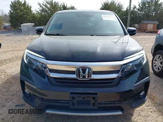 2021 Honda Pilot EX-L with VIN 5FNYF6H57MB064595, listed as a IAAI auction lot 41942327 with 46,150 mi miles and . Bid and sale history available at DreamBid. Image 12.