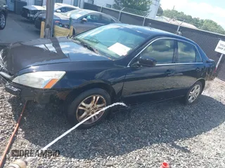2007 Honda Accord LX SE with VIN JHMCM56387C011545, listed as a IAAI auction lot 42632005 with 365,656 mi miles and . Bid and sale history available at DreamBid. Image 2.