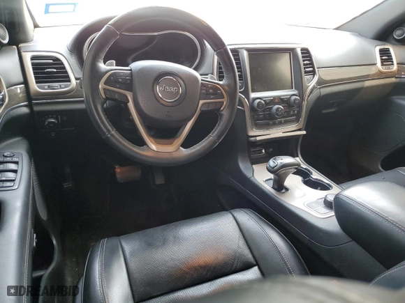 2014 Jeep Grand Cherokee Overland with VIN 1C4RJFCG6EC547604, listed as a Copart auction lot 55824944 with 128,330 mi miles and Clean Title. Bid and sale history available at carsss.com. Image 8.