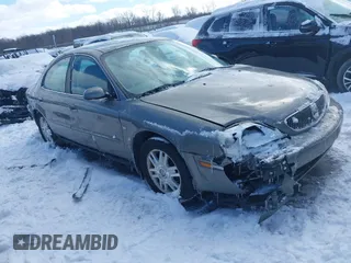 2004 Mercury Sable LS Premium with VIN 1MEFM55S04A619587, listed as a IAAI auction lot 41571950 with 125,444 mi miles. Bid and sale history available at carsss.com. Image 1.