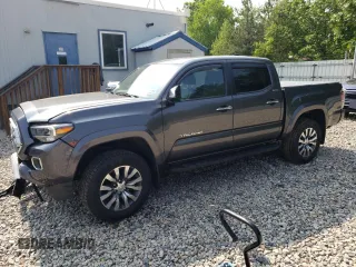 2020 Toyota Tacoma Limited with VIN 3TMGZ5ANXLM310931, listed as a Copart auction lot 60538025 with 59,172 mi miles and Salvage title. Bid and sale history available at DreamBid. Image 1.